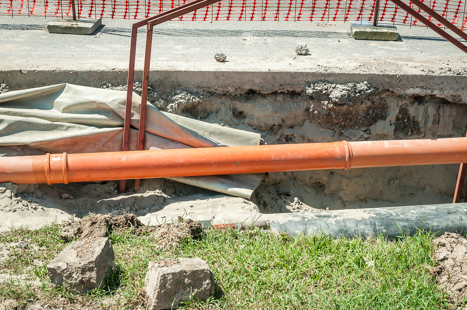 commercial gas pipework - excavation site with visible pipes